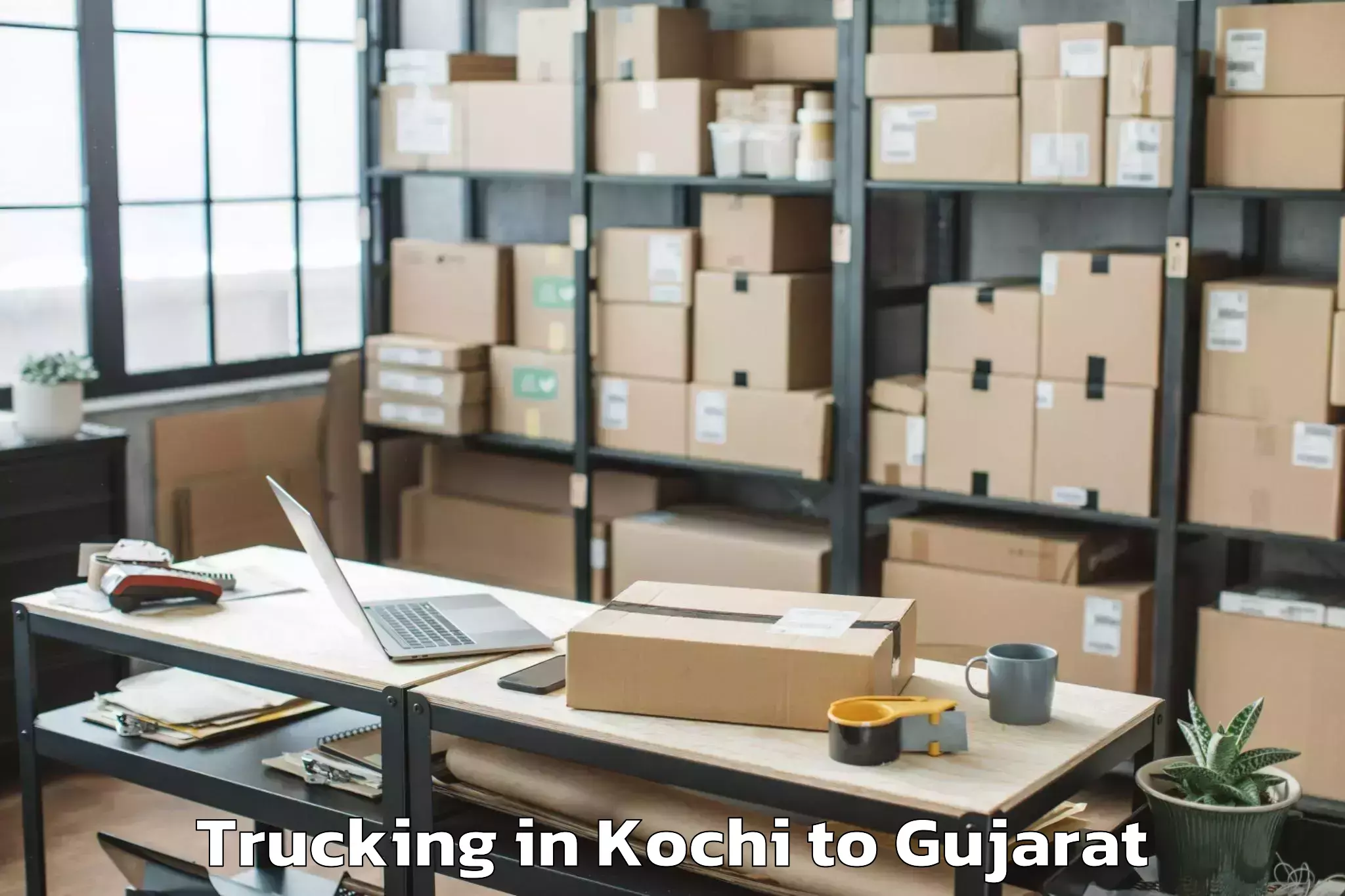 Top Kochi to Shehera Trucking Available